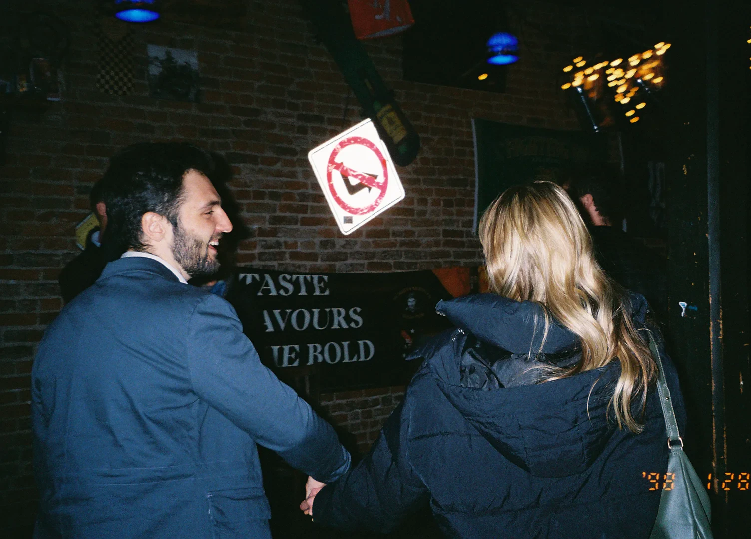 Jack and Kaitlyn holding hands at 10 Barrel Brewing